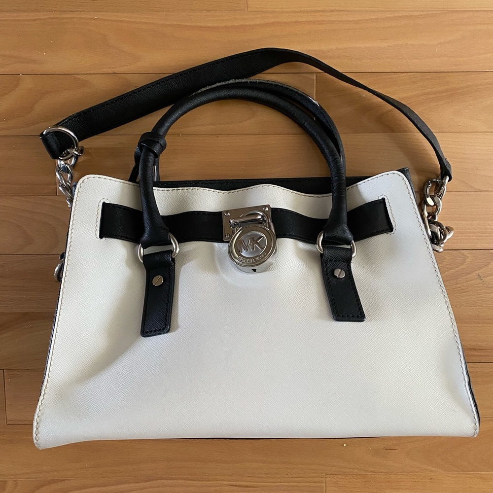 Michael Kors black and white mini Hamilton purse. Gently used